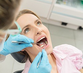 Woman receiving gum disease treatment