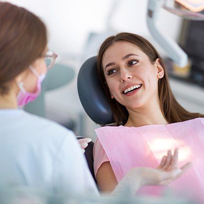 Smiling woman in dental chair