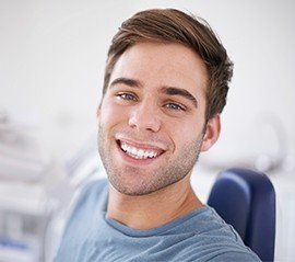 Smiling man in dental chair