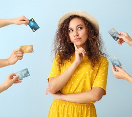 Woman surrounded by credit cards