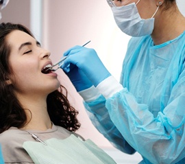 Woman having dental procedure