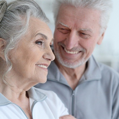 Smiling older man and woman