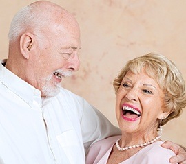 Laughing older man and woman
