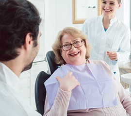 Smiling older woman in dental chair