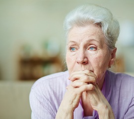 One of the negative effects of missing teeth is lower self-confidence and self-esteem