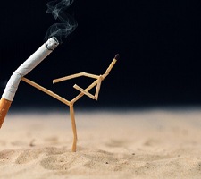 a stickman kicking cigarette for dental implant care in Fargo