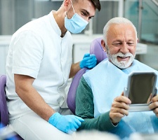 a patient undergoing routine dental implant care in Fargo