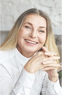 Smiling older woman with long hair