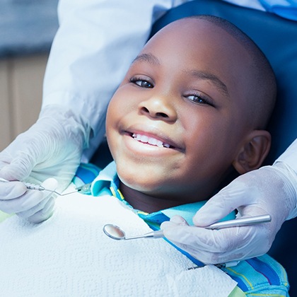 child having their teeth examined by a family dentist in Fargo