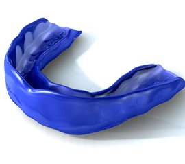 Close up of a blue mouthguard with white background