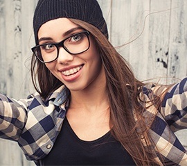 Young woman with six month smiles braces