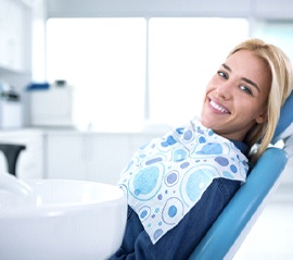 Smiling woman in dental chair