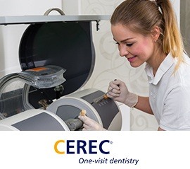 Team member using CEREC milling unit