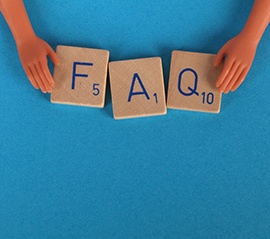 FAQ letter tiles on blue background