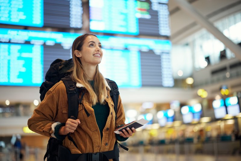 smiling woman at an airport